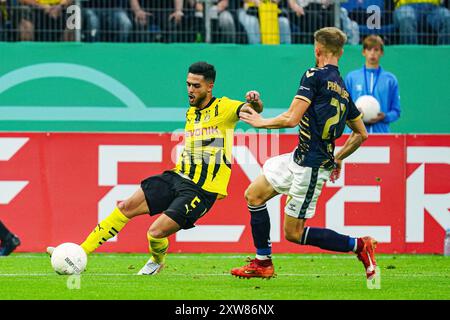 Yan Couto (Borussia Dortmund, #02), Corvin Bock (1. FC Phoenix Luebeck, #27)  GER, 1. FC Phoenix Luebeck vs. Borussia Dortmund, Fussball, DFB-Pokal, Runde 1, Saison 2024/2025, 17.08.2024  Foto: Eibner-Pressefoto/Marcel von Fehrn Stock Photo