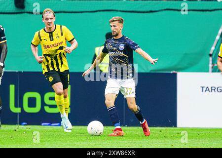 Corvin Bock (1. FC Phoenix Luebeck, #27)  GER, 1. FC Phoenix Luebeck vs. Borussia Dortmund, Fussball, DFB-Pokal, Runde 1, Saison 2024/2025, 17.08.2024  Foto: Eibner-Pressefoto/Marcel von Fehrn Stock Photo