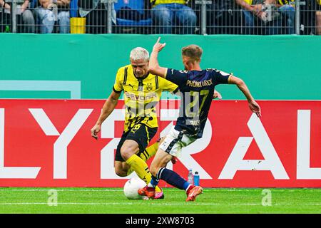 Julian Ryerson (Borussia Dortmund, #26), Corvin Bock (1. FC Phoenix Luebeck, #27)  GER, 1. FC Phoenix Luebeck vs. Borussia Dortmund, Fussball, DFB-Pokal, Runde 1, Saison 2024/2025, 17.08.2024  Foto: Eibner-Pressefoto/Marcel von Fehrn Stock Photo