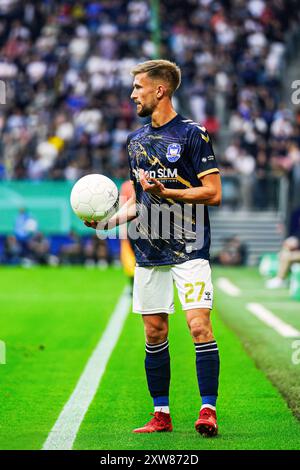 Corvin Bock (1. FC Phoenix Luebeck, #27)  GER, 1. FC Phoenix Luebeck vs. Borussia Dortmund, Fussball, DFB-Pokal, Runde 1, Saison 2024/2025, 17.08.2024  Foto: Eibner-Pressefoto/Marcel von Fehrn Stock Photo