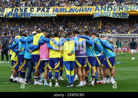 Boca Juniors players form a circle to give a pep talk before the Argentine Professional Football League Tournament 2024 'Cesar Luis Menotti' match against San Lorenzo, at La Bombonera stadium in Buenos Aires, on August 18, 2024. Stock Photo