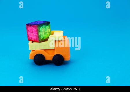 Truck transporting colorful wooden cube Stock Photo