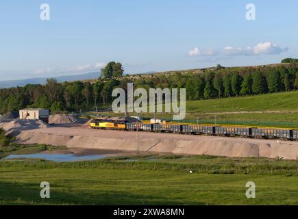 GB Railfreight class 60 diesel locomotive 60047 at Harrisons siding, Shap, Cumbria  with a freight train of box wagons stabled for the weekend Stock Photo