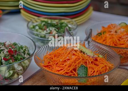 Closeup of various salads on the table Stock Photo
