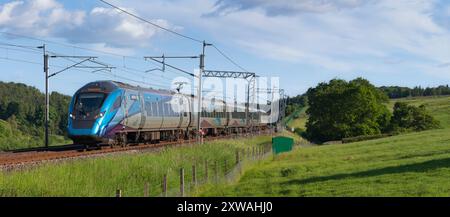 First Transpennine Express class  397 electric high speed train passing through the countryside on the west coast mainline in Cumbria Stock Photo