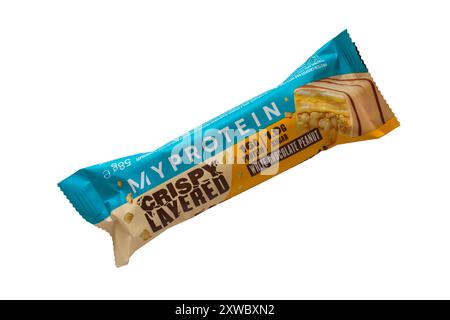 My Protein MyProtein crispy layered white chocolate peanut bar isolated on white background - high protein bar, high protein food Stock Photo