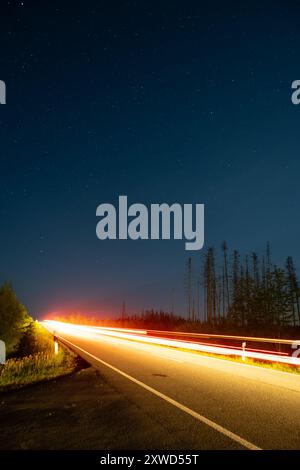Long Exposure picture with Light trails and starry night Stock Photo