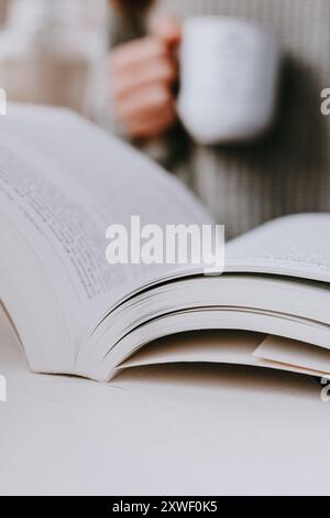 Close-up of an open book on a light background Stock Photo