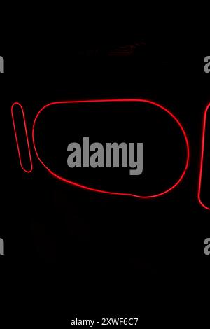 A view of red glowing abstract light against a black background. Stock Photo