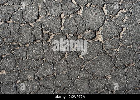 Cracked asphalt texture. Top view. Asphalt. Road background Stock Photo