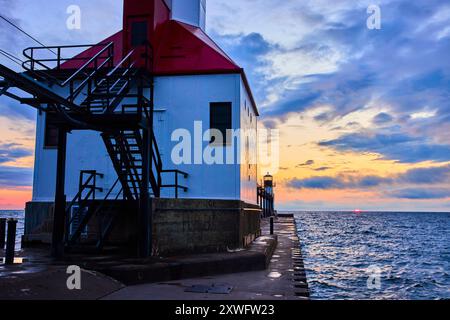 Sunset at Benton Harbor Lighthouse on North Pier from Eye-Level Perspective Stock Photo