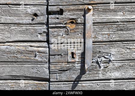 Detail old lock on wooden door broken Stock Photo