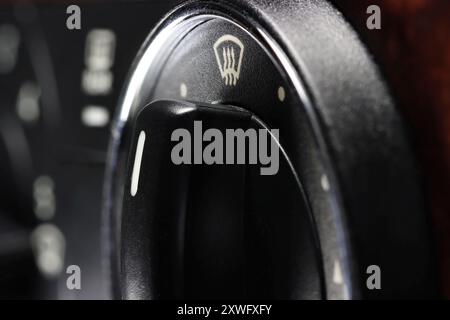 air flow direction switch inside a used car Stock Photo