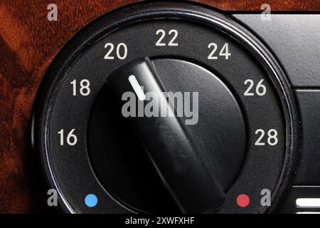 temperature control switch inside a used car at 20 degrees Celsius Stock Photo