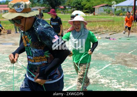 Coconut Shell Race at local community event, Bongkud, Ranau, Sabah ...