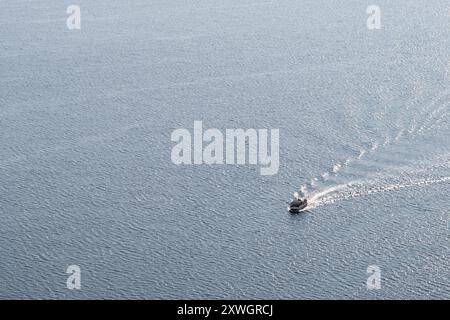 A Shuttle Boat on Jenny Lake in Grand Teton National Park Stock Photo