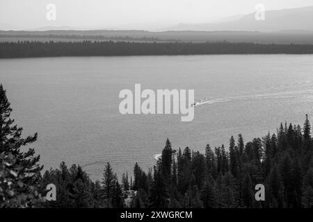 A Shuttle Boat on Jenny Lake in Grand Teton National Park Stock Photo