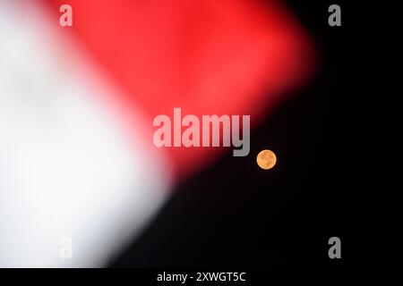 Bandung, West Java, Indonesia. 20th Aug, 2024. The first supermoon of the year, also known as the Sturgeon Moon, was visible in the sky in Bandung, Indonesia. (Credit Image: © Dimas Rachmatsyah/ZUMA Press Wire) EDITORIAL USAGE ONLY! Not for Commercial USAGE! Stock Photo
