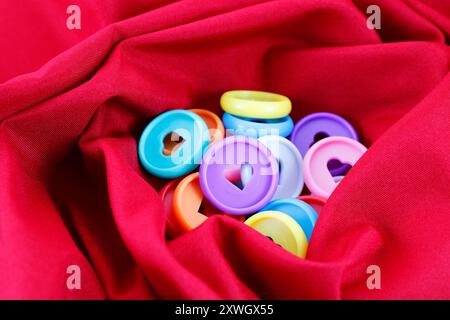 Colorful circles with openwork heart in their center Stock Photo