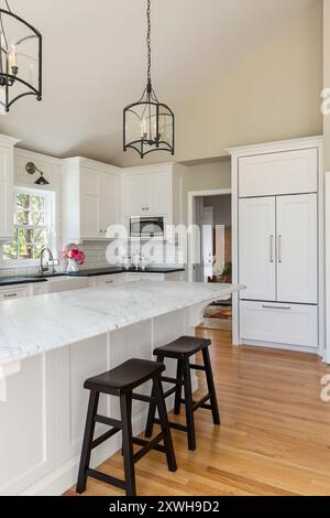 White upscale kitchen with black accents Stock Photo