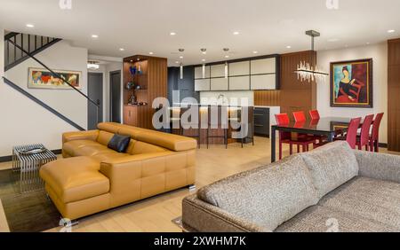 View from living space into kitchen in newly remodeled condo space Stock Photo