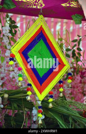 A little multicolor dream catcher, Beautiful multicolored handmade dream catcher on blur background Stock Photo