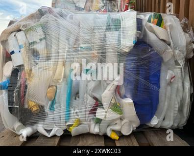 Plastic bottles,compressed into bales and ready for recycling. Zero waste concept. Stock Photo