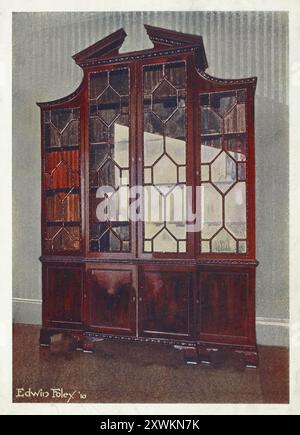 Möbel um die Jahrhundertwende 1900, Geschnitztes Chippendale-Bibliotheksregal (1910 - 1911), Carved Chippendale library bookcase (1910 - 1911).jpg Stock Photo