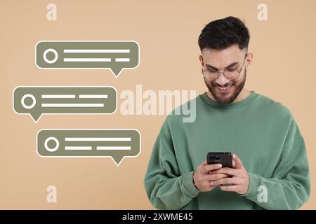 Happy man sending message via smartphone on beige background. Speech bubbles near him Stock Photo