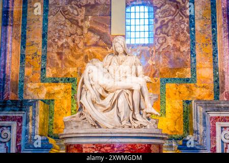 VATICAN CITY - JANUARY 13, 2019: Our Lady of Piety (Madonna della Pieta), the iconic Renaissance sculpture by Michelangelo, located in St. Peter’s Bas Stock Photo