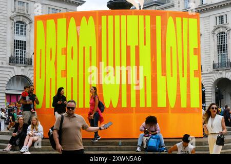 Piccadilly Circus, London, UK.20th Aug 2024. Art Installation at the statue of Eros, Piccadilly Circus.  Good Things Come to Those Who Wait: Yinka Ilori- steel, birch plywood. Credit: Matthew Chattle/Alamy Live News Stock Photo