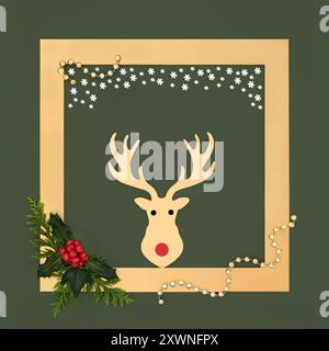 Christmas reindeer, snowflakes, holly, beads on green background with gold frame border. Festive symbols of Xmas Eve santa helper. Stock Photo