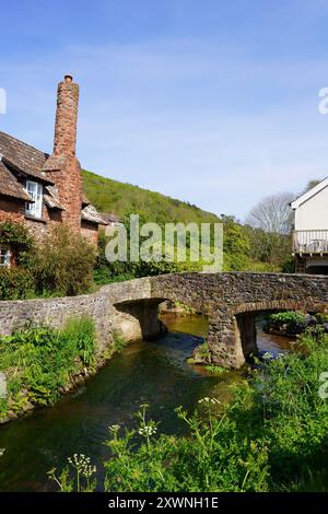 Packhorse Bridge Over The River Aller at Allerford Village, Exmoor National Park, Somerset, England, UK in May Stock Photo