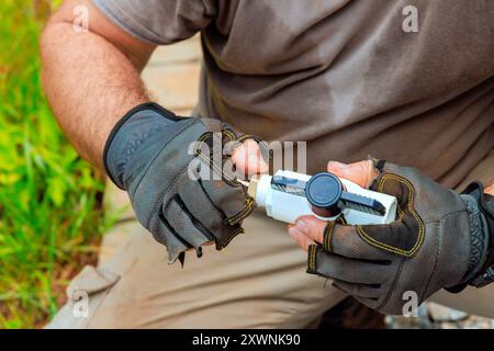 Before installing pvc plastic faucets, plumbers seal them together Stock Photo