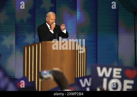 Chicago, USA. 19th Aug, 2024. U.S. President Joe Biden speaks during the 2024 Democratic National Convention in Chicago, Illinois, the United States, on Aug. 19, 2024. The 2024 Democratic National Convention (DNC) kicked off at the United Center in Chicago, the U.S. state of Illinois on Monday, as thousands of pro-Palestinian demonstrators marched near the venue to express their dissatisfaction with the Biden administration's handling of the Israeli-Palestinian conflict. Credit: Wu Xiaoling/Xinhua/Alamy Live News Stock Photo