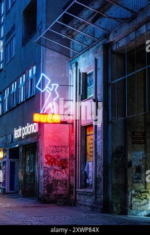 Ruch newspaper agnet kiosk neon sign on a building at 1950s communist style Constitution Square (Plac Konstytucji), Warsaw, Poland Stock Photo