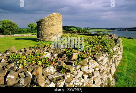 Stump of the Round Tower inside massive walls of Nendrum Monastery, Mahee Island, Strangford Lough, Co. Down, Northern Ireland Stock Photo