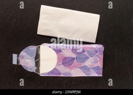Dry napkins on slate stone, macro, top view. Stock Photo