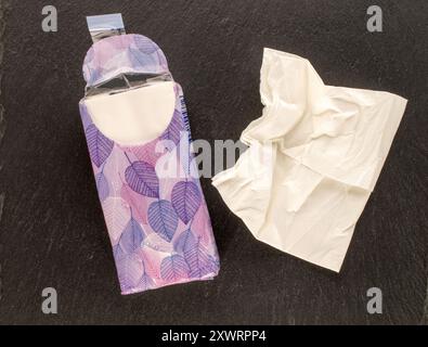 Dry napkins on slate stone, macro, top view. Stock Photo