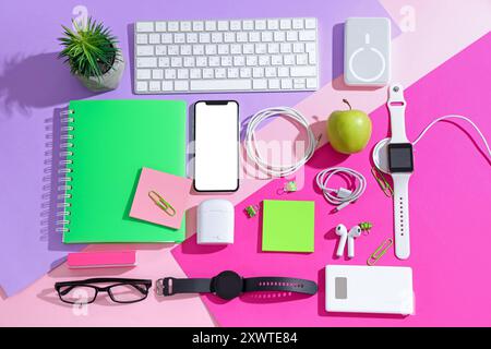 Composition with different modern gadgets and stationery on color background Stock Photo