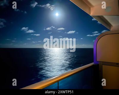 Moon over the ocean from a cruise ship balcony Stock Photo