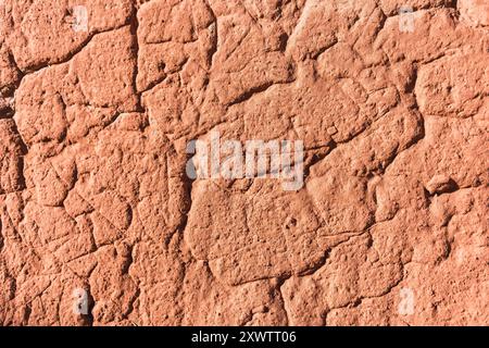 Texture of earth and adobe wall with cracks and grooves in the Andes mountain range Stock Photo