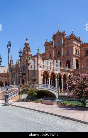 Plaza de España, the most famous square in Seville, designed by Aníbal González and featuring Art Deco and Neo-Mudéjar architectural elements, Spain Stock Photo