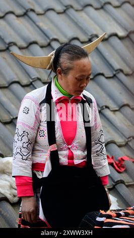 A Long Horn Miao woman at Long Ga village in Guizhou, China. Stock Photo