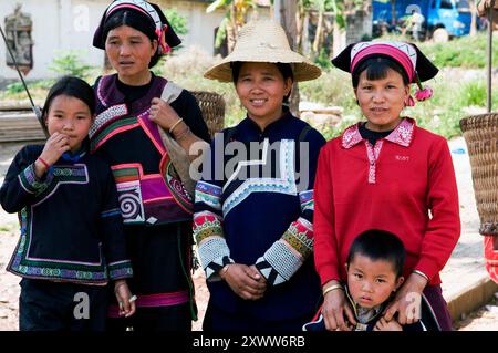 Yao and Hani people in a local market in south Yunnan province Stock Photo