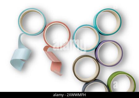 A bunch of colorful tape rolls are stacked on top of each other. The colors include pink, blue, green, and purple. Concept of creativity and organizat Stock Photo