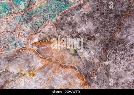 High-resolution image of natural quartzite texture showcasing detailed patterns and earthy tones. Stock Photo