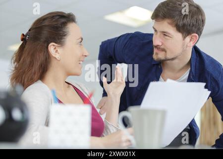 man and woman office worker in office Stock Photo