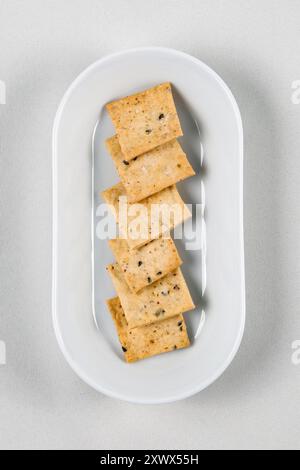 Homemade vegetable crackers or biscuits isolated on white background Stock Photo