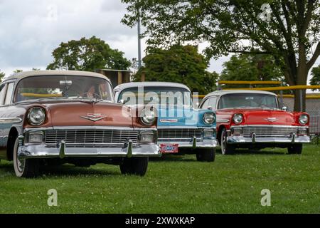 ROYAL OAK, MI/USA - AUGUST 17, 2024: Three Chevrolet Bel Air cars, on the Woodward Dream Cruise, near Detroit, Michigan. Stock Photo